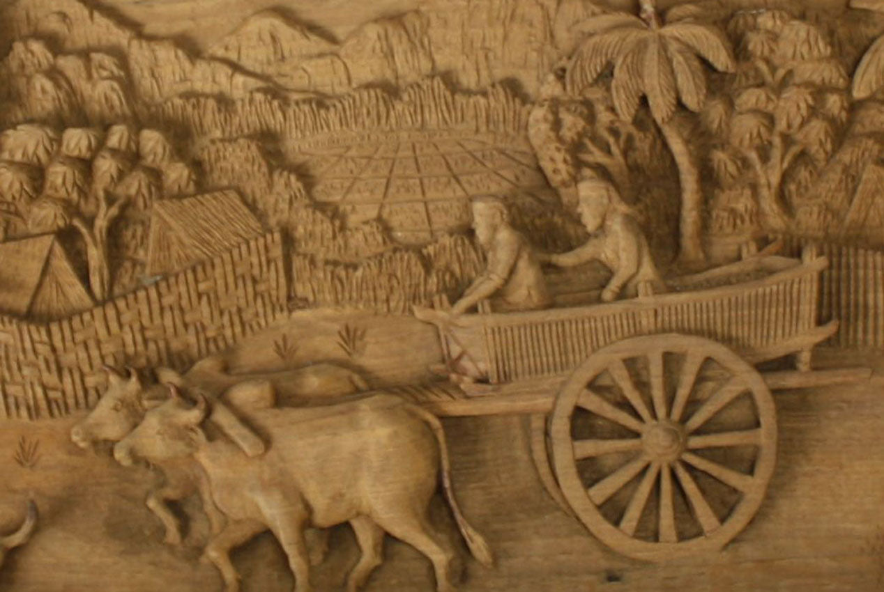 Old Thai Carved Teak Wall Panel of a village scene, 101cm long - farangshop-co