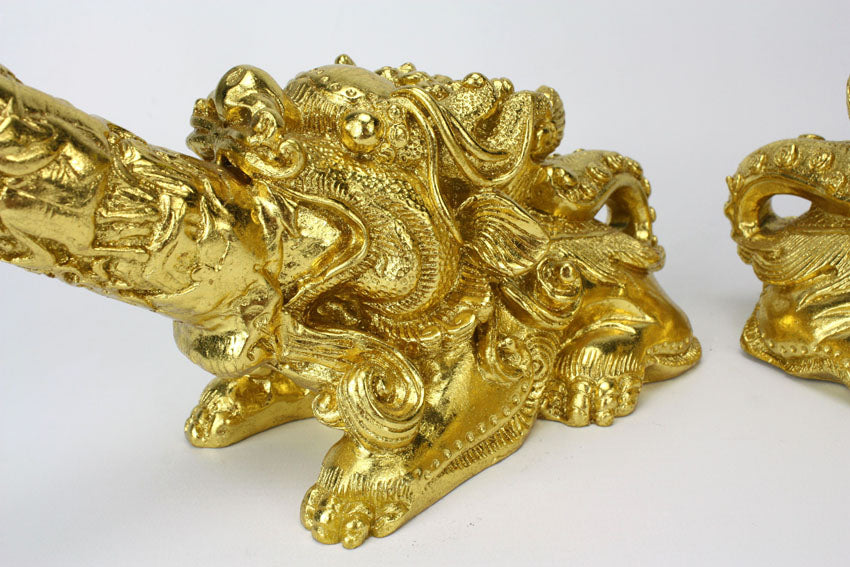 Pair of gold tusks in intricate detail mounted on Chinese lion - farangshop-co