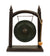 Thai metal gong, antique bronze finish - dark wood with conical finials, 34.5cm high - farangshop-co